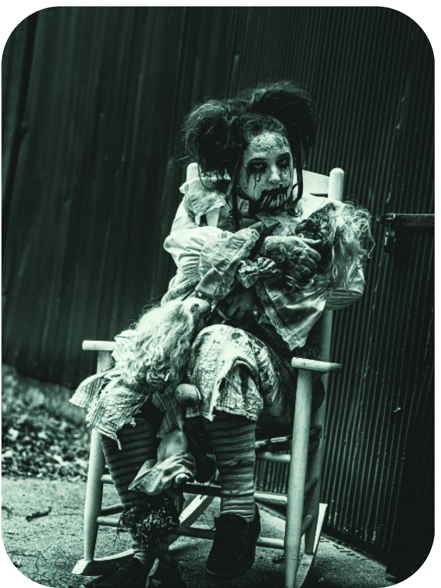 Jolly: a doll-like figure in a torn dress and pigtails seated in a rocking chair, clutching a doll.